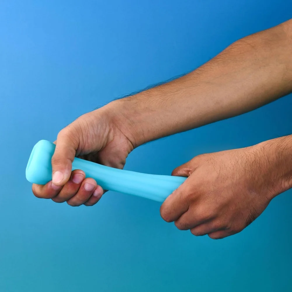 Stretching the soft silicone sleeve by hand